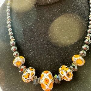 Elegant Orange and Black Beaded Necklace